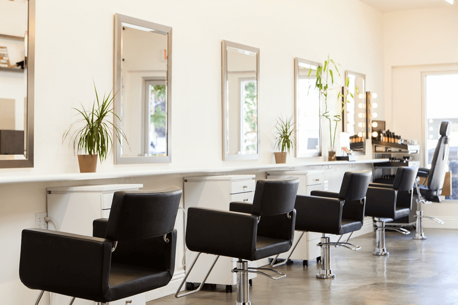 Luxury hair salon interior at efoxx HAIR in Los Angeles, featuring modern styling stations and elegant decor